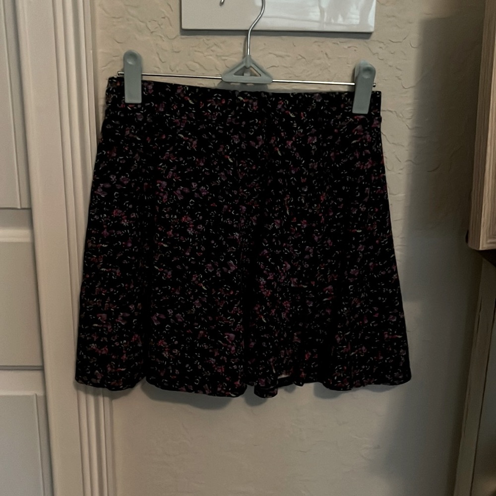 Black skirt with purple flowers